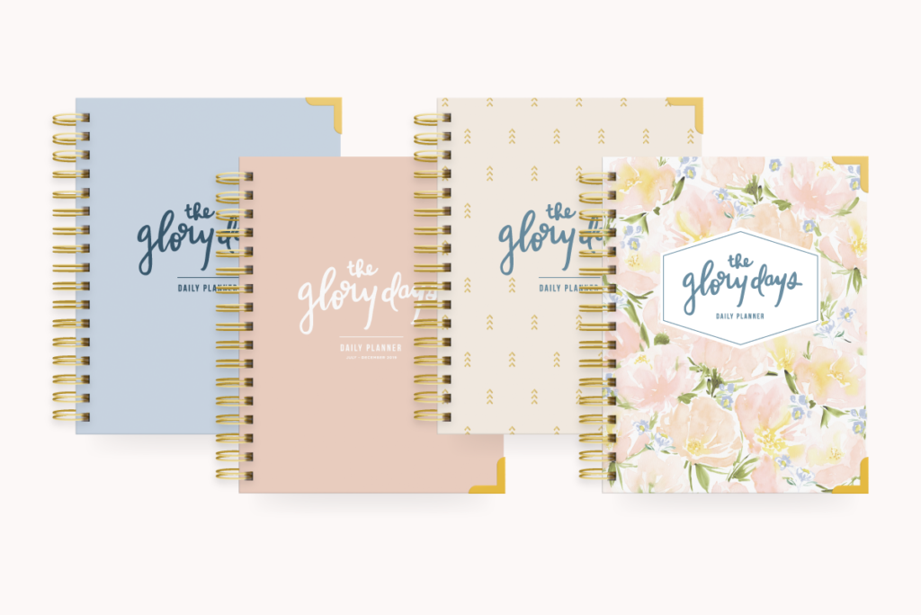 line up of blue, blush, cream, and pink floral Glory Days planners