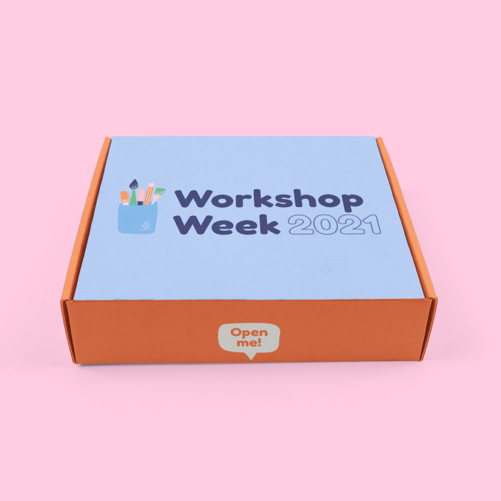 example of a client experience piece: a periwinkle custom mailing box with orange sides that says, "workshop week 2021"